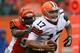 CINCINNATI, OH - NOVEMBER 17: Jason Campbell #17 of the Cleveland Browns is sacked by Wallace Gilberry #95 of the Cincinnati Bengals at Paul Brown Stadium on November 17, 2013 in Cincinnati, Ohio. (Photo by Andy Lyons/Getty Images)