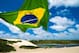 NATAL, BRAZIL - NOVEMBER 14: View of Genipabu lagoon with a Brazilian flag on November 14, 2013 in Natal, Brazil. The Ecological Tourist Park Dunes Genipabu includes a beach, a large complex of dunes, a lagoon and a protected area (Photo by Buda Mendes/