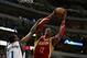 Nov 20, 2013; Dallas, TX, USA; Houston Rockets center Dwight Howard (12) shoots against Dallas Mavericks center Samuel Dalembert (1) in the second quarter at American Airlines Center. Mandatory Credit: Matthew Emmons-USA TODAY Sports