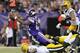 MINNEAPOLIS, MN - OCTOBER 27: Adrian Peterson #28 of the Minnesota Vikings carries the ball for a touchdown against Morgan Burnett #42 and Micah Hyde #33 of the Green Bay Packers during the second quarter of the game on October 27, 2013 at Mall of America