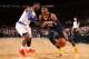 NEW YORK, NY - NOVEMBER 20: Paul George #24 of the Indiana Pacers drives against Iman Shumpert #21 of the New York Knicks during a game at Madison Square Garden in New York City on November 20, 2013. NOTE TO USER: User expressly acknowledges and agrees t