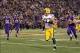 Oct 27, 2013; Minneapolis, MN, USA; Green Bay Packers cornerback Micah Hyde (33) returns a punt for a touchdown during the second quarter against the Minnesota Vikings at Mall of America Field at H.H.H. Metrodome. Mandatory Credit: Brace Hemmelgarn-USA TO