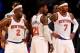 NEW YORK, NY - NOVEMBER 05: Raymond Felton #2,Iman Shumpert #21 and Carmelo Anthony #7 of the New York Knicks wait as the officials review a call in the second half against the Charlotte Bobcats at Madison Square Garden on November 5, 2013 in New York Ci