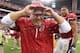 GLENDALE, AZ - SEPTEMBER 15: Head coach Bruce Arians of the Arizona Cardinals reacts after being dunked by gatorade from defensive end Calais Campbell #93 following the NFL game against the Detroit Lions at the University of Phoenix Stadium on September