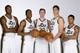 SALT LAKE CITY, UT - SEPTEMBER 30: (from left) Derrick Favors #15, Alec Burks #10, Gordon Hayward #20, Enes Kanter #0 and Trey Burke #3 of the Utah Jazz pose for a photo during 2013 Media Day at Zions Basketball Center on September 30, 2013 in Salt Lake