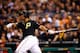 PITTSBURGH, PA - OCTOBER 01: Marlon Byrd #2 of the Pittsburgh Pirates watches his second inning solo home run against the Cincinnati Reds during the National League Wild Card game at PNC Park on October 1, 2013 in Pittsburgh, Pennsylvania. (Photo by Jar