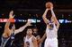 November 20, 2013; Oakland, CA, USA; Golden State Warriors shooting guard Klay Thompson (11) shoots the ball against Memphis Grizzlies center Kosta Koufos (41) during the third quarter at Oracle Arena. The Grizzlies defeated the Warriors 88-81 in overtime