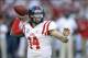 Sep 28, 2013; Tuscaloosa, AL, USA; Mississippi Rebels quarterback Bo Wallace (14) passing against the Alabama Crimson Tide during the first quarter at Bryant-Denny Stadium. Mandatory Credit: John David Mercer-USA TODAY Sports