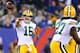 EAST RUTHERFORD, NJ - NOVEMBER 17: Scott Tolzien #16 of the Green Bay Packers passes the ball to Eddie Lacy #27 at MetLife Stadium on November 17, 2013 in East Rutherford, New Jersey.The New York Giants defeated the Green Bay Packers 27-13. (Photo by