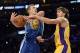 Nov 22, 2013; Los Angeles, CA, USA; Golden State Warriors power forward David Lee (10) loses the ball against Los Angeles Lakers center Pau Gasol during the first half at Staples Center. Mandatory Credit: Richard Mackson-USA TODAY Sports