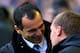 LIVERPOOL, ENGLAND - NOVEMBER 23: Liverpool Manager Brendan Rodgers speaks to Everton Manager Roberto Martinez (L) prior to the Barclays Premier League match between Everton and Liverpool at Goodison Park on November 23, 2013 in Liverpool, England. (Pho