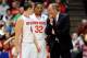 DAYTON, OH - MARCH 22: Head coach Thad Matta of the Ohio State Buckeyes talks to Aaron Craft #4 and Lenzelle Smith, Jr. #32 in the first half against the Iona Gaels during the second round of the 2013 NCAA Men's Basketball Tournament at UD Arena on March