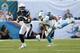 MIAMI GARDENS, FL - NOVEMBER 17: Don Jones #36 of the Miami Dolphins pursues Keenan Allen #13 of the San Diego Chargers as he runs with the ball on November 17, 2013 at Sun Life Stadium in Miami Gardens, Florida. The Dolphins defeated the Chargers 20-16.