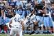 Nov 23, 2013; Chapel Hill, NC, USA; North Carolina Tar Heels running back Khris Francis (1) runs the ball as Old Dominion Monarchs safety Fellonte Misher (24) makes the tackle during the first half at Kenan Memorial Stadium. Mandatory Credit: Rob Kinnan-U