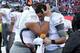TUCSON, AZ - NOVEMBER 23: Quarterback Marcus Mariota #8 of the Oregon Ducks is hugged by defensive tackle Ricky Havili-Heimuli #90 on the sidelines during the final moments of the college football game against the Arizona Wildcats at Arizona Stadium on N