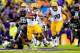 BATON ROUGE, LA - NOVEMBER 23: Running Back Terrence Magee #14 of the LSU Tigers rushes for a first down against the Texas A&M Aggies at Tiger Stadium on November 23, 2013 in Baton Rouge, Louisiana. (Photo by Sean Gardner/Getty Images)