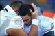Nov 23, 2013; Tucson, AZ, USA; Oregon Ducks quarterback Marcus Mariota (right) is consoled by defensive tackle Ricky Havili-Heimuli after suffering an injury in the fourth quarter against the Arizona Wildcats at Arizona Stadium. Arizona defeated Oregon 42