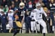 SOUTH BEND, IN - NOVEMBER 23: DaVaris Daniels #10 of the Notre Dame Fighting Irish runs for a touchdown in front of Skye PoVey #7 of the Brigham Young Cougars at Notre Dame Stadium on November 23, 2013 in South Bend, Indiana. (Photo by Jonathan Daniel/Ge