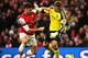 LONDON, ENGLAND - NOVEMBER 23: Goalkeeper Artur Boruc of Southampton loses the ball to Olivier Giroud of Arsenal leading to the opening goal during the Barclays Premier League match between Arsenal and Southampton at Emirates Stadium on November 23, 2013
