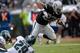 OAKLAND, CA - NOVEMBER 03: Rashad Jennings #27 of the Oakland Raiders rushes for an eight yard touchdown against the Philadelphia Eagles during the second quarter at O.co Coliseum on November 3, 2013 in Oakland, California. (Photo by Thearon W. Henderso
