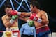 MACAU - NOVEMBER 24: Manny Pacquiao (R) of the Philippines punches Brandon Rios of the U.S. during their 'Clash in Cotai' WBO International Welterweight title fight on November 24, 2013 in Macau. (Photo by Nicky Loh/Getty Images)