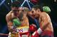 MACAU - NOVEMBER 24: Manny Pacquiao (R) of the Philippines punches Brandon Rios of the U.S. during their 'Clash in Cotai' WBO International Welterweight title fight on November 24, 2013 in Macau. (Photo by Nicky Loh/Getty Images)