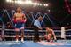 MACAU - NOVEMBER 24: Manny Pacquiao (L) of the Philippines walks away as Brandon Rios of the U.S. falls during their 'Clash in Cotai' WBO International Welterweight title fight on November 24, 2013 in Macau. (Photo by Nicky Loh/Getty Images)