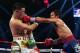 MACAU - NOVEMBER 24: Manny Pacquiao (R) of the Philippines punches Brandon Rios of the U.S. during their 'Clash in Cotai' WBO International Welterweight title fight on November 24, 2013 in Macau. (Photo by Nicky Loh/Getty Images)