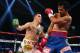 MACAU - NOVEMBER 24: Manny Pacquiao (R) of the Philippines fights with Brandon Rios of the U.S. during their 'Clash in Cotai' WBO International Welterweight title bout on November 24, 2013 in Macau. (Photo by Nicky Loh/Getty Images)