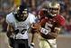 Nov 23, 2013; Tallahassee, FL, USA; Florida State Seminoles quarterback Jameis Winston (5) runs away from pressure by Idaho Vandals defensive end Maxx Forde (40) during the second half at Doak Campbell Stadium. Mandatory Credit: Melina Vastola-USA TODAY S