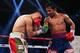 MACAU - NOVEMBER 24: Manny Pacquiao (R) of the Philippines punches Brandon Rios of the U.S. during their 'Clash in Cotai' WBO International Welterweight title fight on November 24, 2013 in Macau. (Photo by Nicky Loh/Getty Images)
