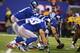 EAST RUTHERFORD, NJ - NOVEMBER 17: Eli Manning #10 of the New York Giants in action against the Green Bay Packers during their game at MetLife Stadium on November 17, 2013 in East Rutherford, New Jersey. (Photo by Al Bello/Getty Images)