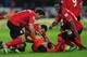 CARDIFF, WALES - NOVEMBER 24: Kim Bo-Kyung (floor) of Cardiff celebrates with team mates after heading in the second Cardiff goal during the Barclays Premier League match between Cardiff City and Manchester United at Cardiff City Stadium on November 24,