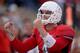 FRESNO, CA - NOVEMBER 23: Derek Carr #4 of the Fresno State Bulldogs reacts after throwing his six touchdown pass of the day against the New Mexico Lobos during the third quarter at Bulldog Stadium on November 23, 2013 in Fresno, California. Fresno State