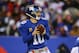 EAST RUTHERFORD, NJ - NOVEMBER 24: Eli Manning #10 of the New York Giants drops back to pass against the Dallas Cowboys during their game at MetLife Stadium on November 24, 2013 in East Rutherford, New Jersey. (Photo by Al Bello/Getty Images)