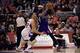 Nov 23, 2013; Los Angeles, CA, USA; Sacramento Kings center DeMarcus Cousins (15) holds the ball defended by Los Angeles Clippers forward Blake Griffin (32) during the fourth quarter at Staples Center. The Los Angeles Clippers defeated the Sacramento King