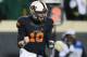 STILLWATER, OK - NOVEMBER 23: Clint Chelf #10 of the Oklahoma State Cowboys celebrates a touchdown against the Baylor Bears in the third quarter at Boone Pickens Stadium on November 23, 2013 in Stillwater, Oklahoma. (Photo by Ronald Martinez/Getty Image