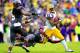 BATON ROUGE, LA - NOVEMBER 23: Running Back Jeremy Hill #33 of the LSU TIgiers rushes for a first down against the Texas A&M Aggies at Tiger Stadium on November 23, 2013 in Baton Rouge, Louisiana. (Photo by Sean Gardner/Getty Images)