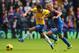 LONDON, ENGLAND - OCTOBER 26: Mesut Oezil of Arsenal is challenged by Dean Moxey of Crystal Palace during the Barclays Premier League match between Crystal Palace and Arsenal at Selhurst Park on October 26, 2013 in London, England. (Photo by Clive Rose/