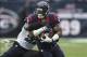 Nov 24, 2013; Houston, TX, USA; Houston Texans running back Dennis Johnson (28) runs with the ball as Jacksonville Jaguars outside linebacker Geno Hayes (55) attempts to make a tackle during the second quarter at Reliant Stadium. Mandatory Credit: Troy Ta