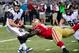 Sep 26, 2013; St. Louis, MO, USA; San Francisco 49ers nose tackle Glenn Dorsey (90) sacks St. Louis Rams quarterback Sam Bradford (8) during the first half at the Edward Jones Dome. Mandatory Credit: Scott Rovak-USA TODAY Sports