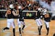 Nov 23, 2013; Stillwater, OK, USA; Multiple Oklahoma State Cowboys celebrate after Cowboys cornerback Tyler Patmon (26) ran a fumble recovery for a touchdown against the Baylor Bears at Boone Pickens Stadium. Mandatory Credit: Mark D. Smith-USA TODAY Spor