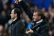 LIVERPOOL, ENGLAND - NOVEMBER 23: Liverpool Manager Brendan Rodgers and Everton Manager Roberto Martinez issue instructions during the Barclays Premier League match between Everton and Liverpool at Goodison Park on November 23, 2013 in Liverpool, England