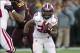 Nov 23, 2013; Minneapolis, MN, USA; Wisconsin Badgers running back James White (20) rushes with the ball in the first quarter against the Minnesota Golden Gophers at TCF Bank Stadium. Mandatory Credit: Jesse Johnson-USA TODAY Sports