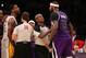 LOS ANGELES, CA - NOVEMBER 24: DeMarcus Cousins #15 of the Sacramento Kings and Shawne Williams #3 of the Los Angeles Lakers exchange words during an altercation in the game at Staples Center on November 24, 2013 in Los Angeles, California. The Lakers wo