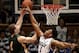 Nov 24, 2013; Durham, NC, USA; Duke Blue Devils forward Jabari Parker (1) defends against Vermont Catamounts forward Brian Voelkel (1) as he shoots at Cameron Indoor Stadium. Mandatory Credit: Mark Dolejs-USA TODAY Sports