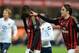 MILAN, ITALY - NOVEMBER 23: Mario Balotelli of AC Milan (L) dejected after his penalty miss during the Serie A match between AC Milan and Genoa CFC at Stadio Giuseppe Meazza on November 23, 2013 in Milan, Italy. (Photo by Claudio Villa/Getty Images)