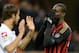 MILAN, ITALY - NOVEMBER 23: Mario Balotelli of AC Milan dejected during the Serie A match between AC Milan and Genoa CFC at Stadio Giuseppe Meazza on November 23, 2013 in Milan, Italy. (Photo by Claudio Villa/Getty Images)
