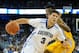 OMAHA, NE - NOVEMBER 8: Doug McDermott #3 of the Creighton Bluejays drives past Tyrel Hunt #0 of the Alcorn State Braves during their game at CenturyLink Center on November 8, 2013 in Omaha, Nebraska. (Photo by Eric Francis/Getty Images)