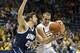 Nov 21, 2013; Milwaukee, WI, USA; Marquette Golden Eagles guard Jake Thomas (23) drives for the basket as New Hampshire Wildcats guard Scott Morris (22) defends during the first half at BMO Harris Bradley Center. Mandatory Credit: Jeff Hanisch-USA TODAY S